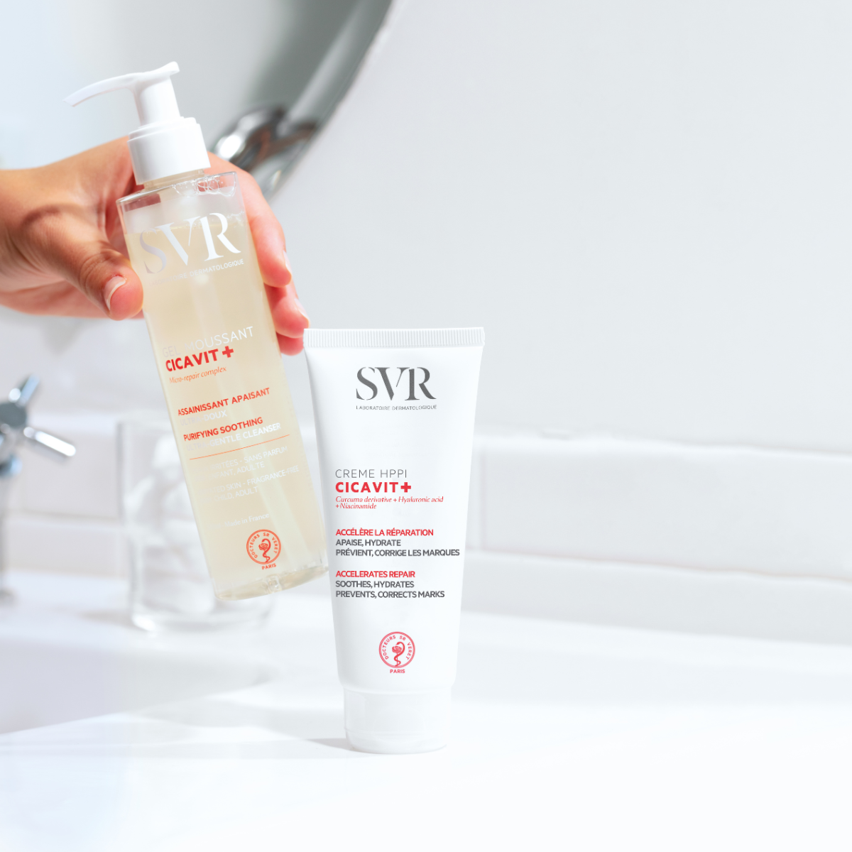 SVR Cicavit+ HPPI cream tube and pump bottle cleanser on a white bathroom counter.